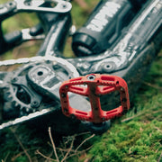 https://cdn.shopify.com/s/files/1/0284/9430/files/OneUpComponents_CompositePedals_RED_Lifestyle2.jpg?v=1747436600