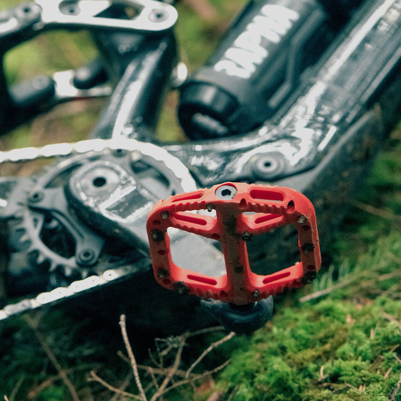 https://cdn.shopify.com/s/files/1/0284/9430/files/OneUpComponents_CompositePedals_RED_Lifestyle2.jpg?v=1747436600