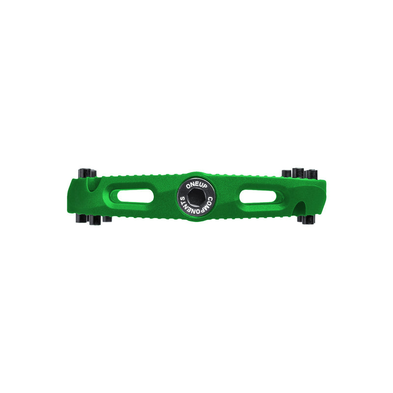 https://cdn.shopify.com/s/files/1/0284/9430/files/OneUpComponents_SmallCompPedals_GRN_Outboard.jpg?v=1748299408