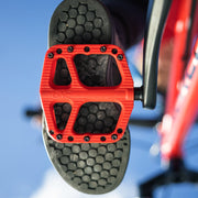 https://cdn.shopify.com/s/files/1/0284/9430/files/OneUpComponents_SmallCompPedals_RED_OnBike1.jpg?v=1748299408