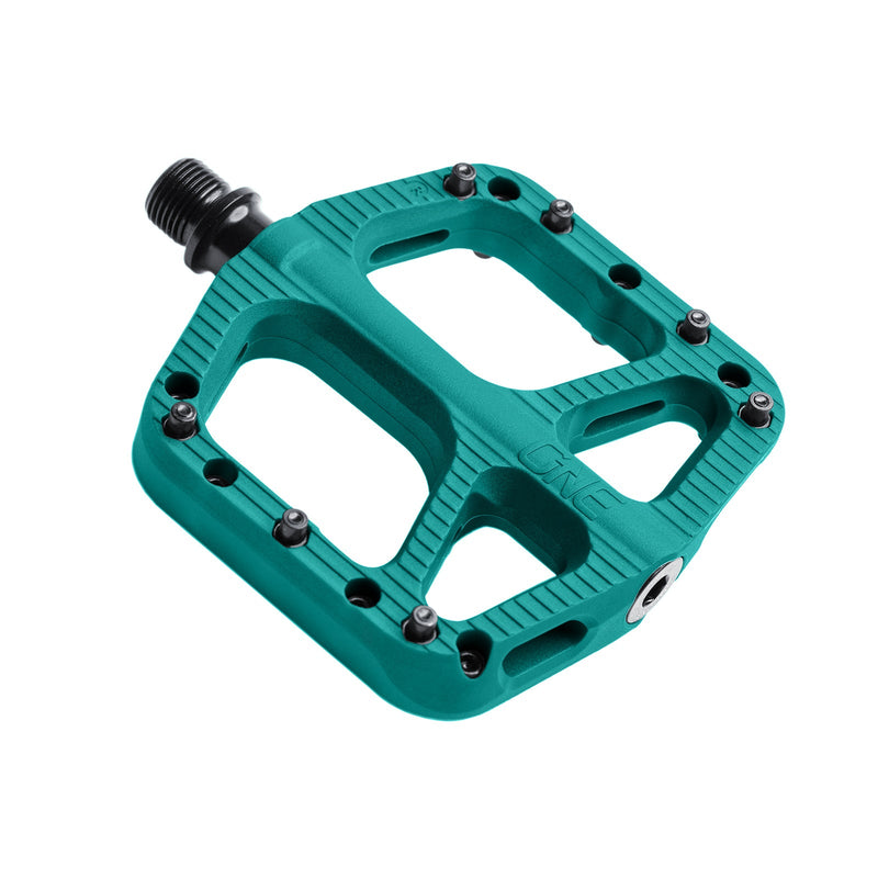 https://cdn.shopify.com/s/files/1/0284/9430/files/OneUpComponents_SmallCompPedals_TUR_Angle.jpg?v=1748299408